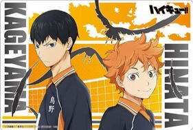 Image Kageyama (on the left) and Hinata (on the right) from the series haikyuu. They are looking at the camera.